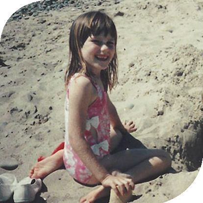 Jen Johansen as a kid in the sand in Carpinteria